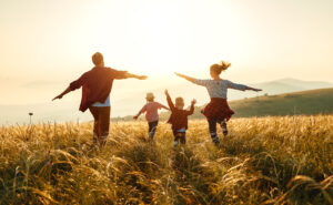 Happy,Family:,Mother,,Father,,Children,Son,And,Daughter,On,Nature